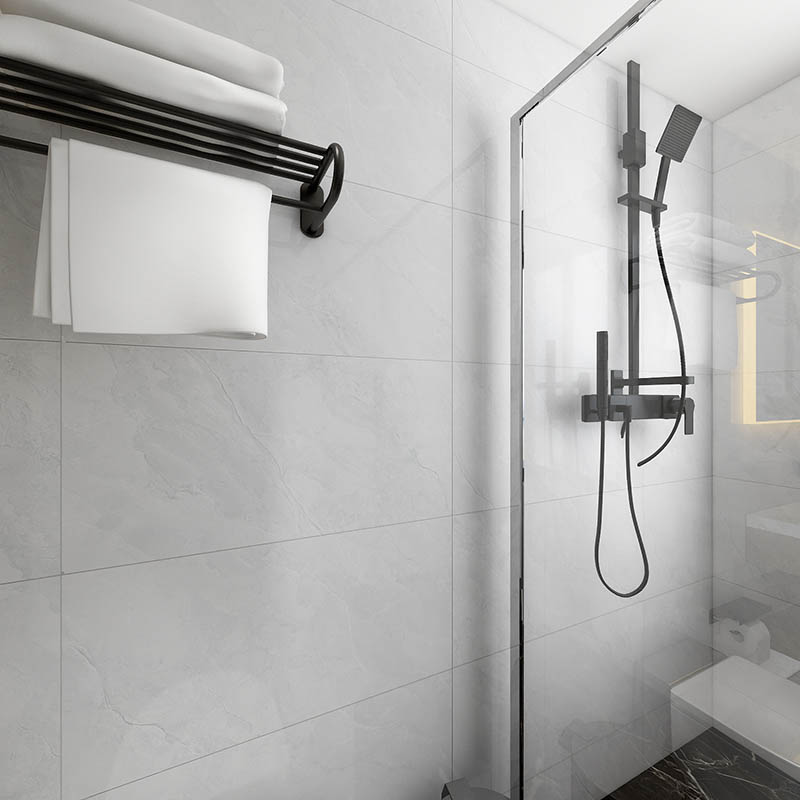 shower with tile walls